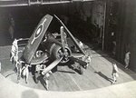 Corsair_being_pushed_on_elevator_HMS_Glory_(R62)_1945.jpg