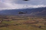 A Blackhawk in flight with the mountains in the background - Kosovo.JPG