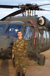 Me in front of a Blackhawk 2 - Camp Bondsteel, Kosovo - Nov. 11, 2002.JPG