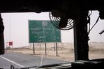 Roadsign on Highway 80 through the Kuwaiti desert - Feb. 20, 2004.JPG