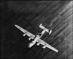 B-24, after being struck by bomb from another plane.jpg
