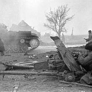 The soviet infantry and KV-85 heavy tank near Warsaw, Poland, January 1945